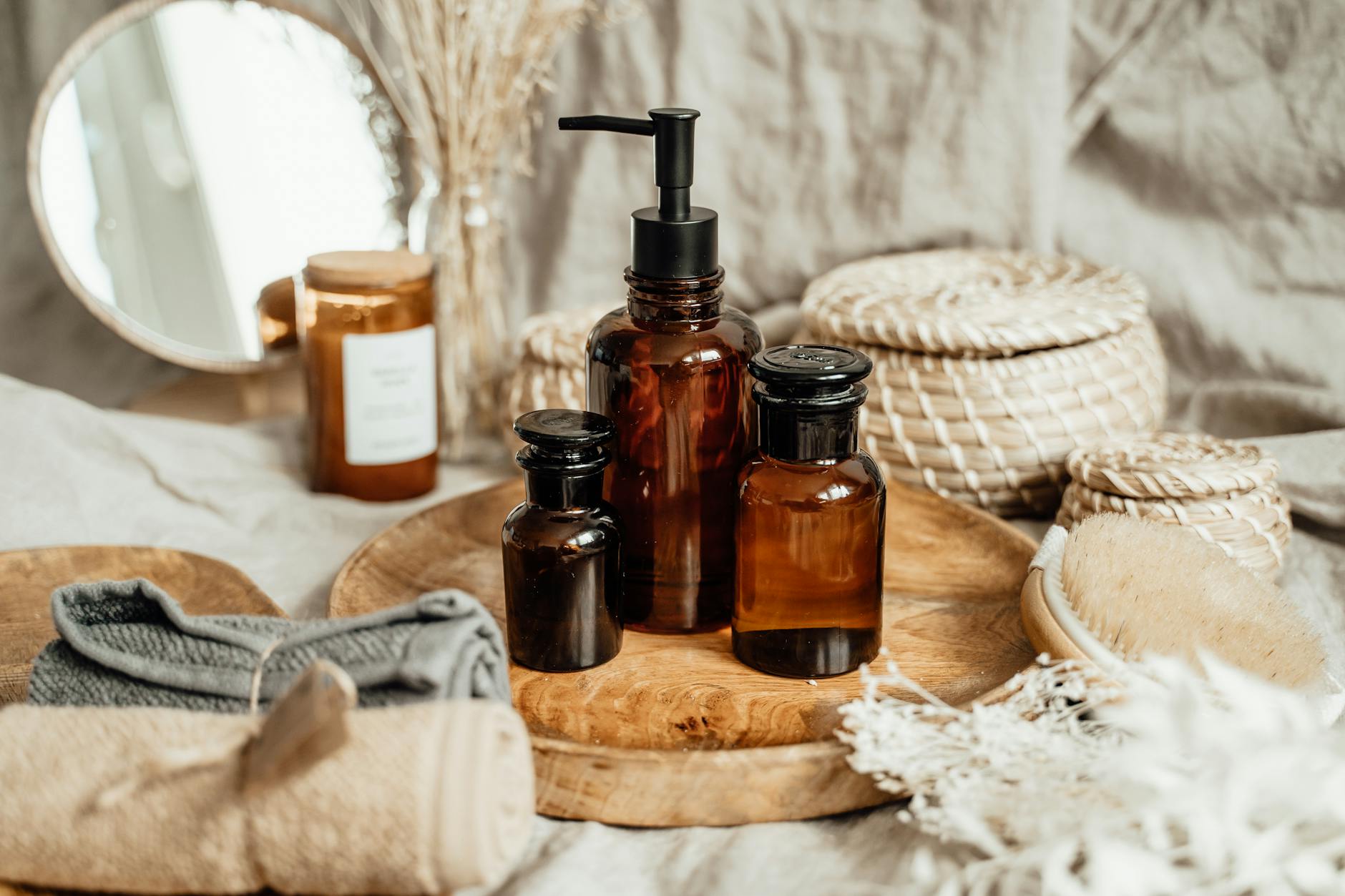 brown glass bottles on brown wooden tray